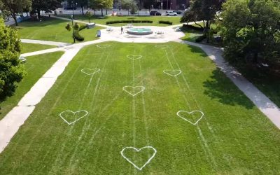 Painted hearts encourage residents to enjoy downtown parks while remaining socially distant