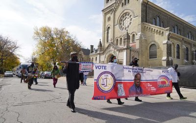 Community stakeholders hold voting rallies to “Light Up” Milwaukee and cause “Good Trouble”