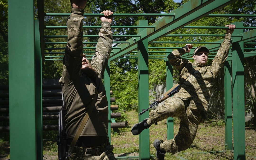 Russia’s brutal advances strain Ukrainian front-line troops just as mobilization law comes into force